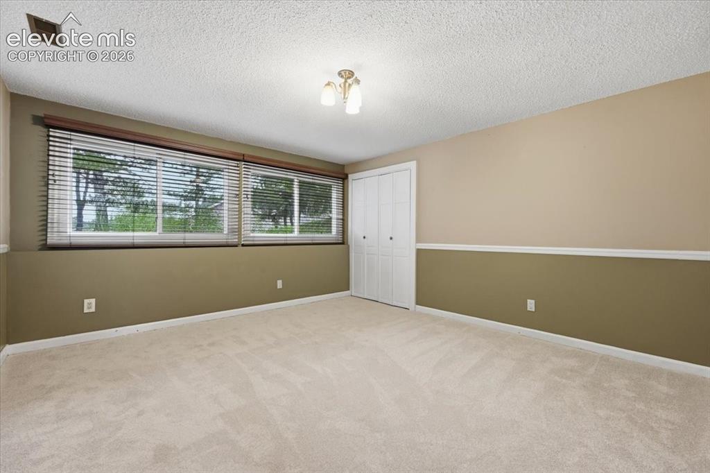 Image 37 of 49: basement bedroom, garden level good light