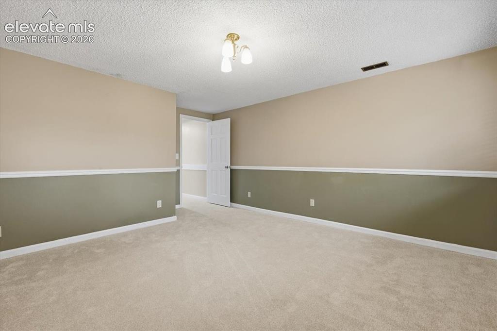 Image 38 of 49: basement bedroom, garden level with good light