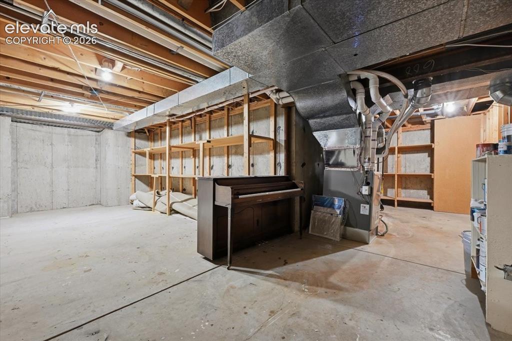 Image 42 of 49: Storage Area in Basement is huge!