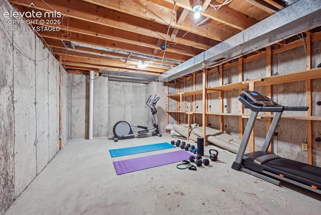 Image 43 of 49: "VIRTUALLY STAGED"
Area has potential for use as a gym