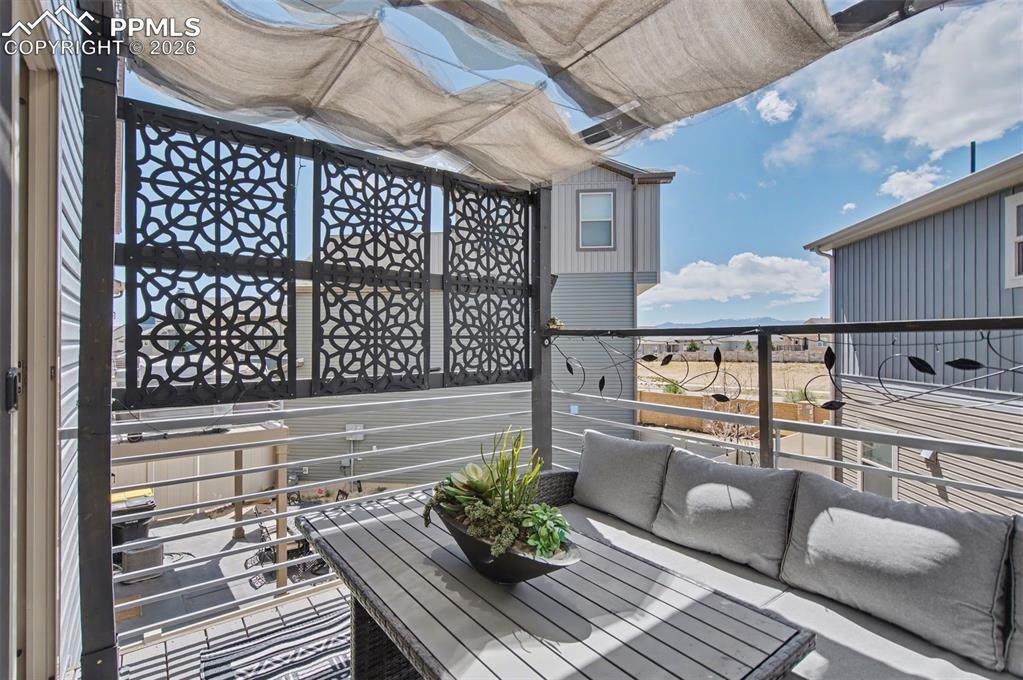 Image 10 of 28: Deck with View of Mountains