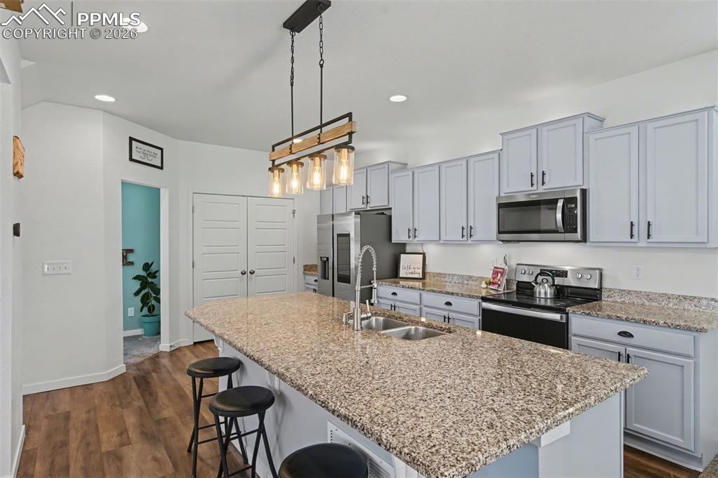 Image 11 of 28: Kitchen with View of Pantry & Office/Study/Craft Room