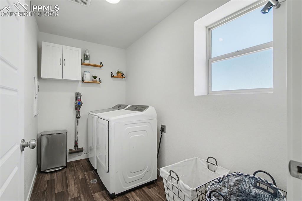 Image 20 of 28: Laundry with Window, Upper Level