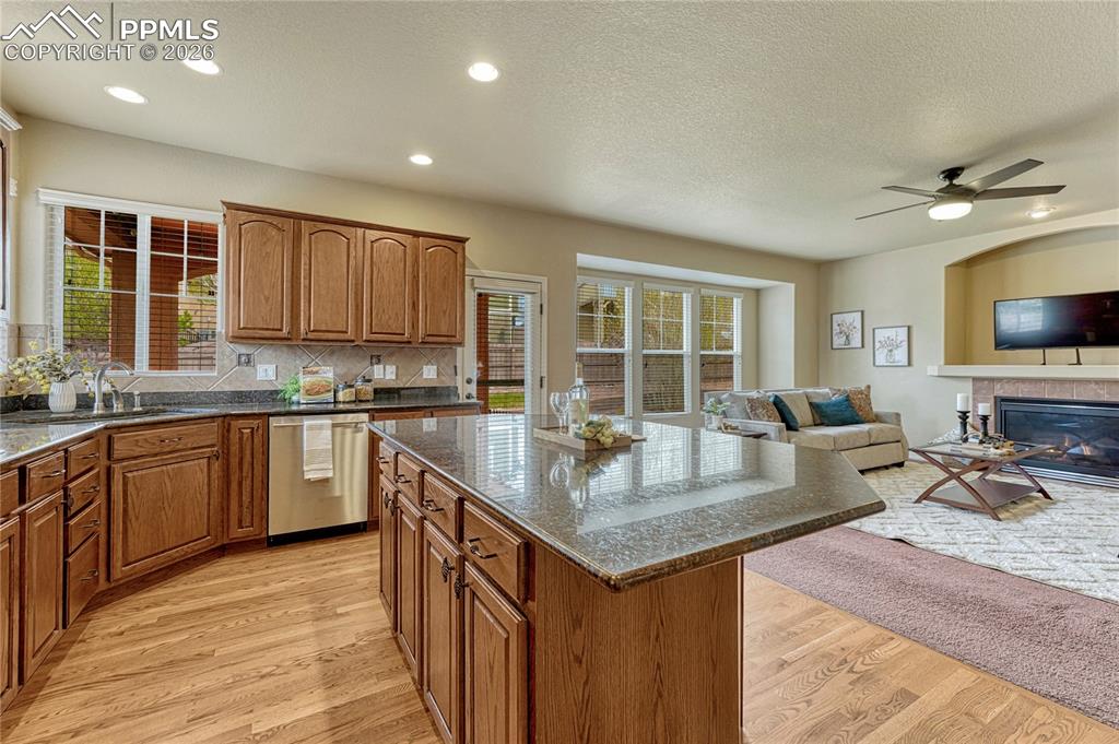 Image 11 of 50: Large windows brighten the dining experience, blending the elegance of form