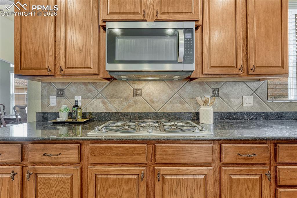 Image 13 of 50: The heart of the home effortlessly bridges culinary creativity and family d