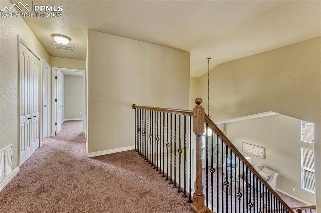 Image 23 of 50: A conveniently located main-level powder room offers privacy and ease for y