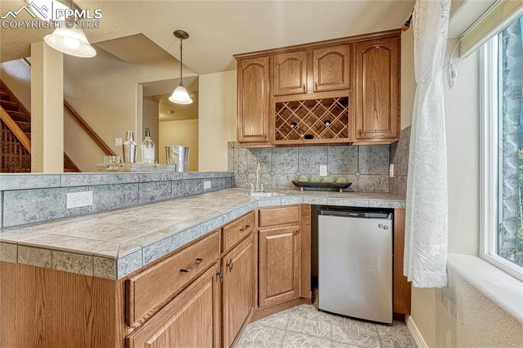 Image 34 of 50: An upper level full bathroom provides everyday convenience and privacy
