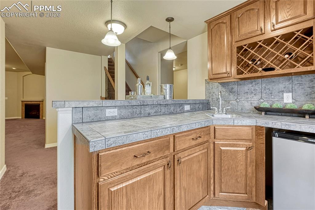 Image 35 of 50: A third upper level bedroom offers a great space and natural light
