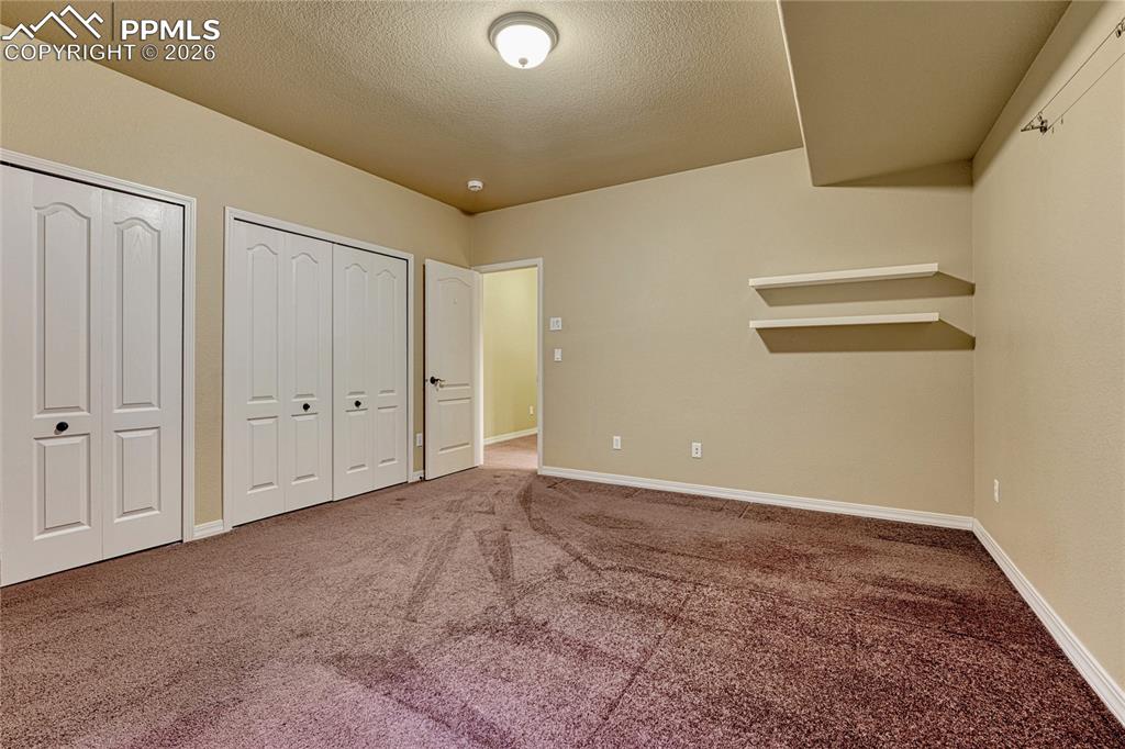 Image 42 of 50: Having a dedicated full bathroom in the basement ensures that lower-level g