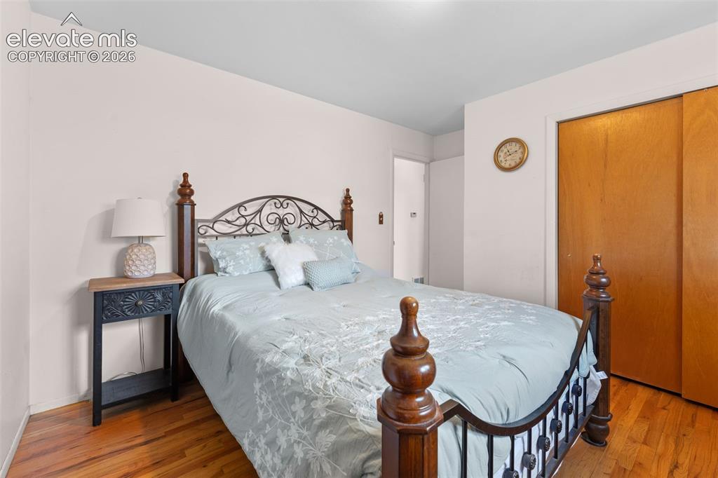Image 9 of 50: Hardwood-style flooring throughout