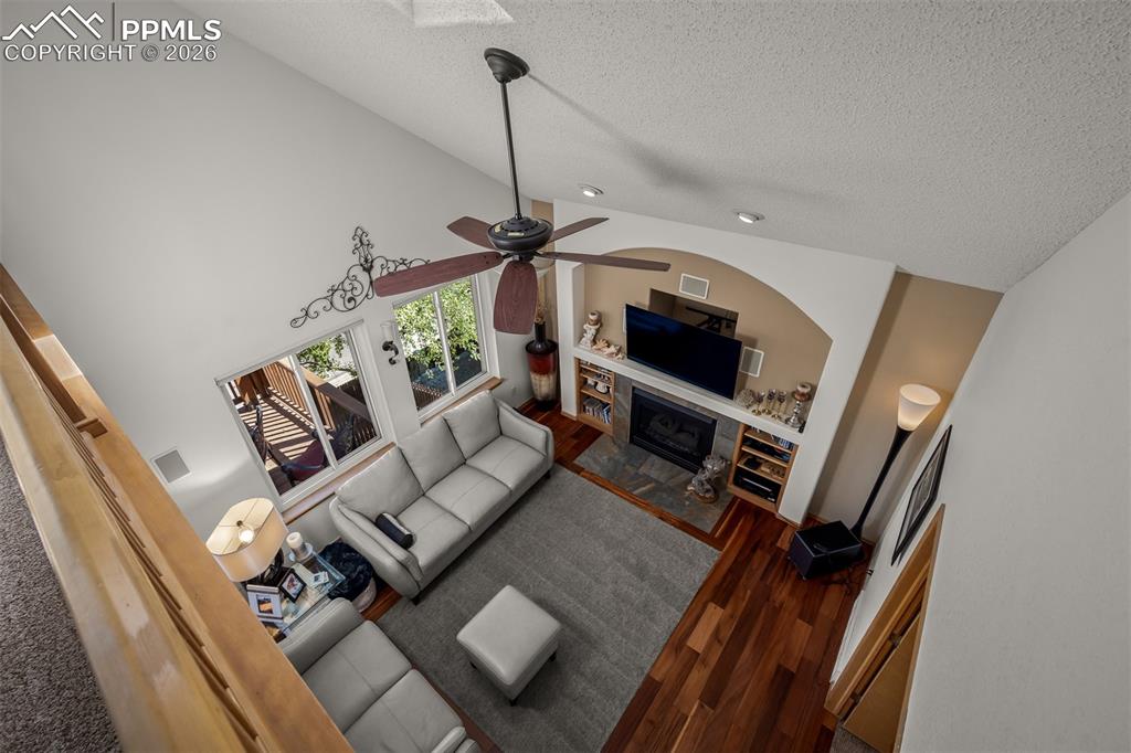 Image 24 of 50: View from loft of family room.