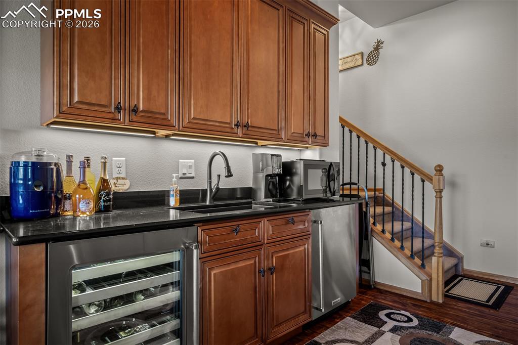 Image 35 of 50: another view of game room wet bar.