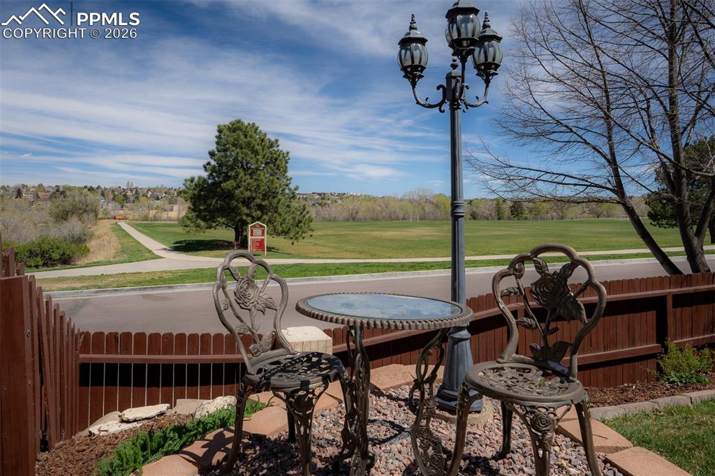 Image 46 of 50: Street lamp, table and chairs.  Perfect for romantic afternoon or evening c