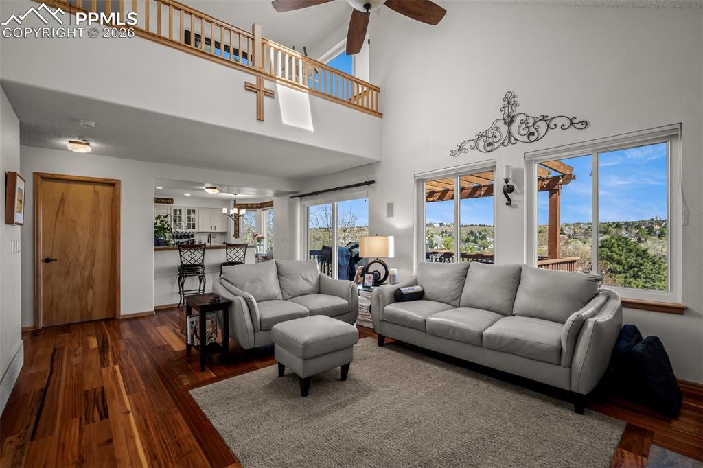 Image 7 of 50: Seanic view of park looking back to kitchen from the family room.  
Loft a