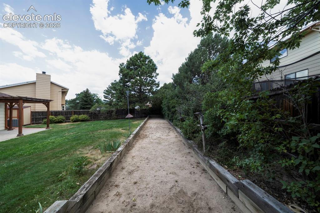 Image 22 of 45: Sand Bocce Ball court