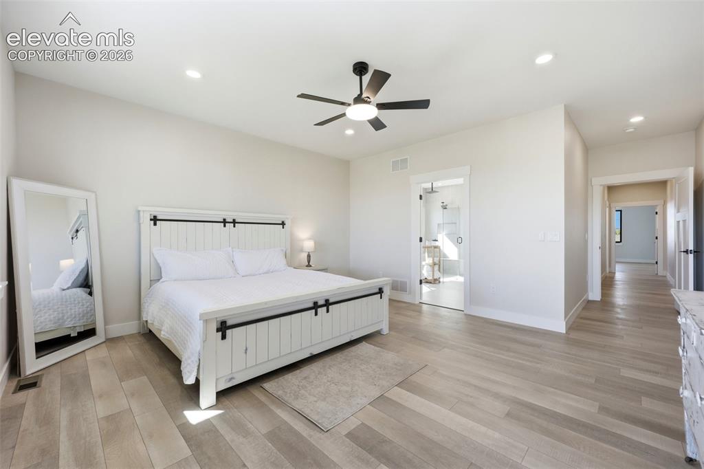 Image 21 of 50: Master Bedroom