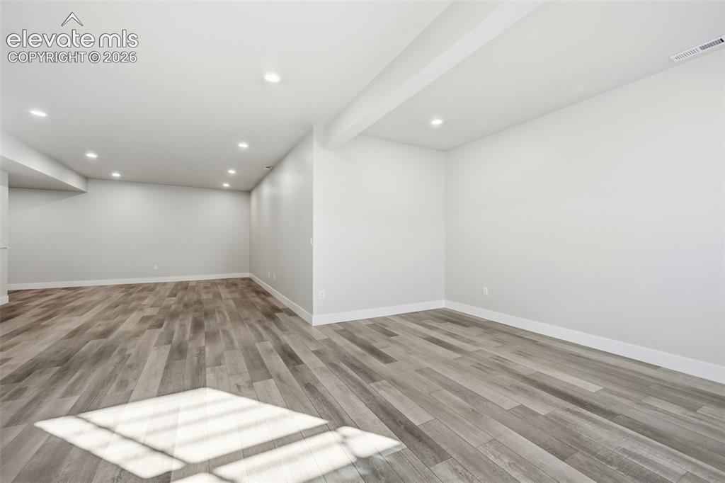 Image 44 of 50: Recreation room area in basement