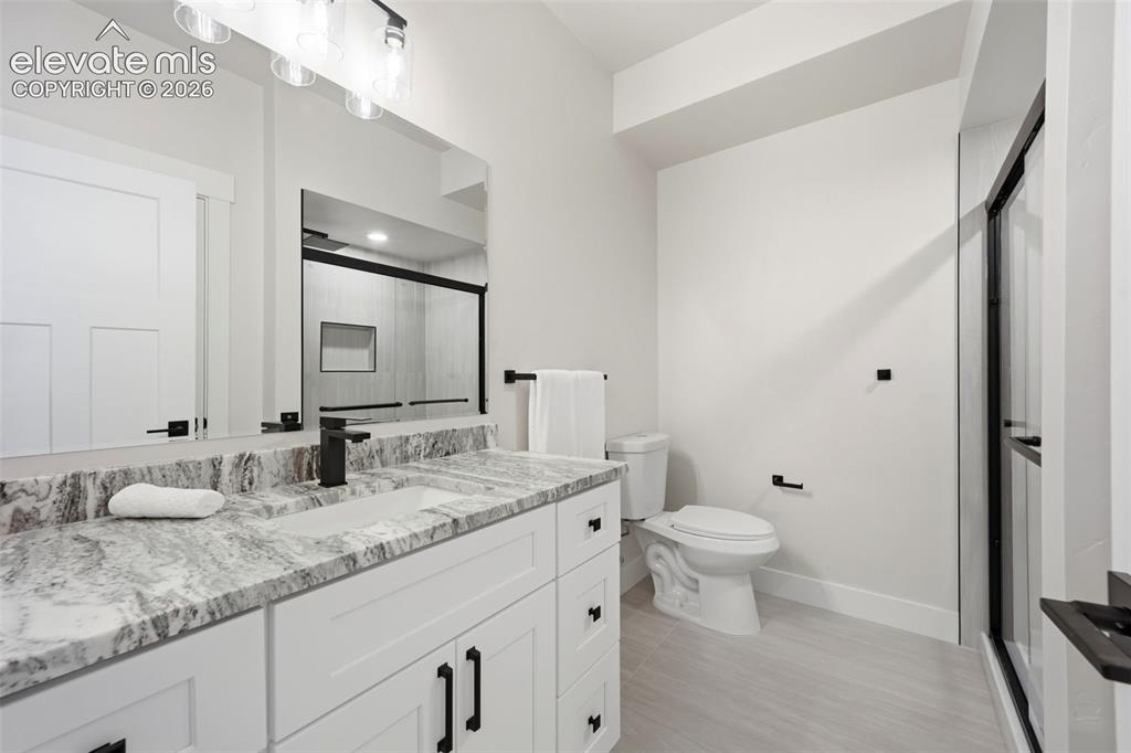 Image 46 of 50: Basement bathroom 3/4 with walk in showere