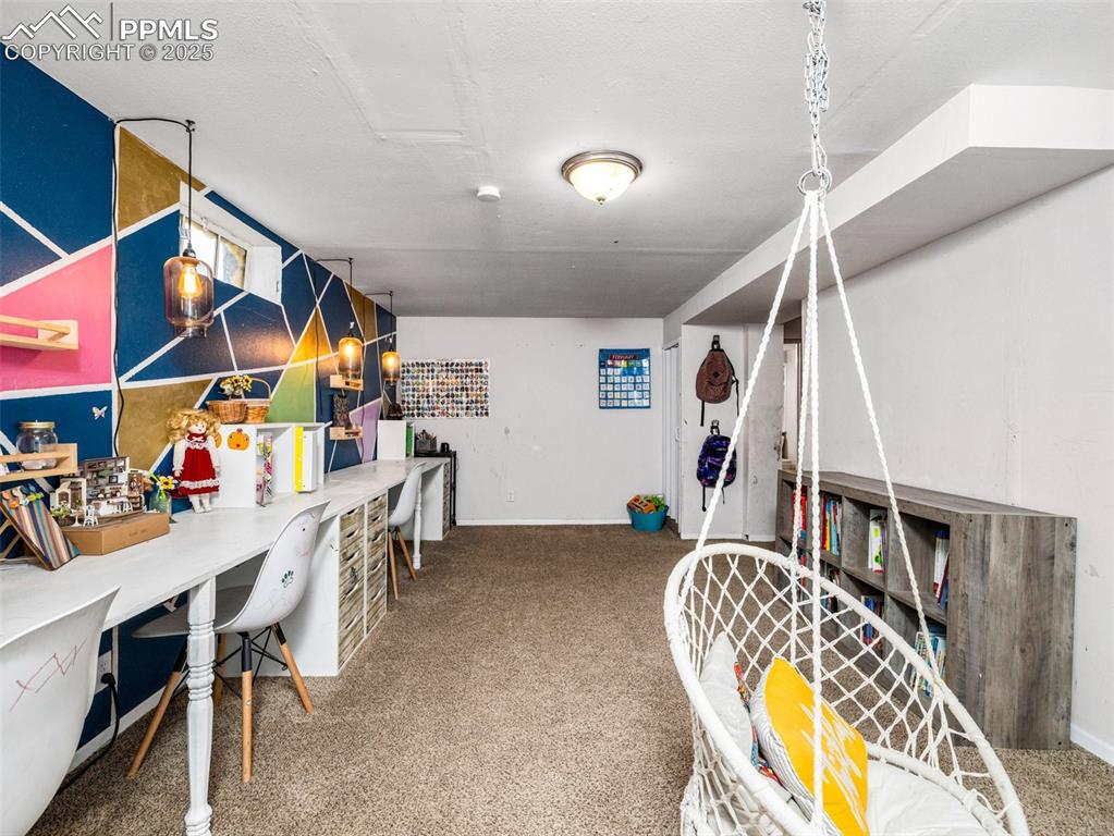 Image 22 of 33: Playroom with carpet and an office area