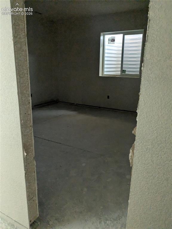 Image 34 of 45: basement bedroom