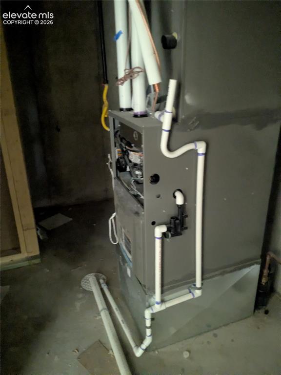 Image 38 of 45: Central HVAC unit with PVC drainage, insulated lines, and electrical condui