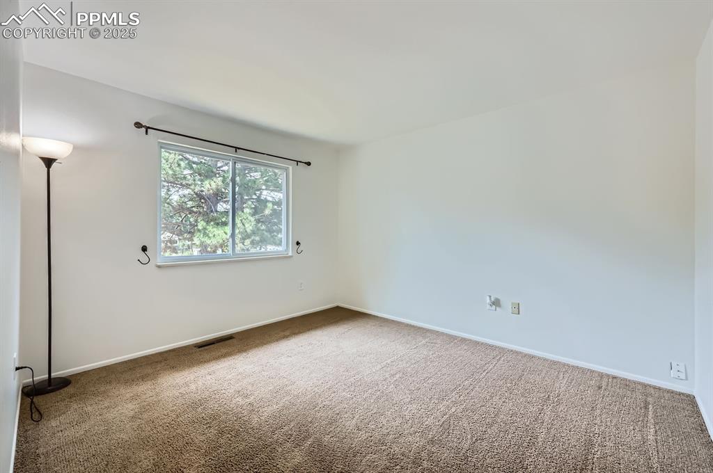 Image 15 of 28: Bedroom