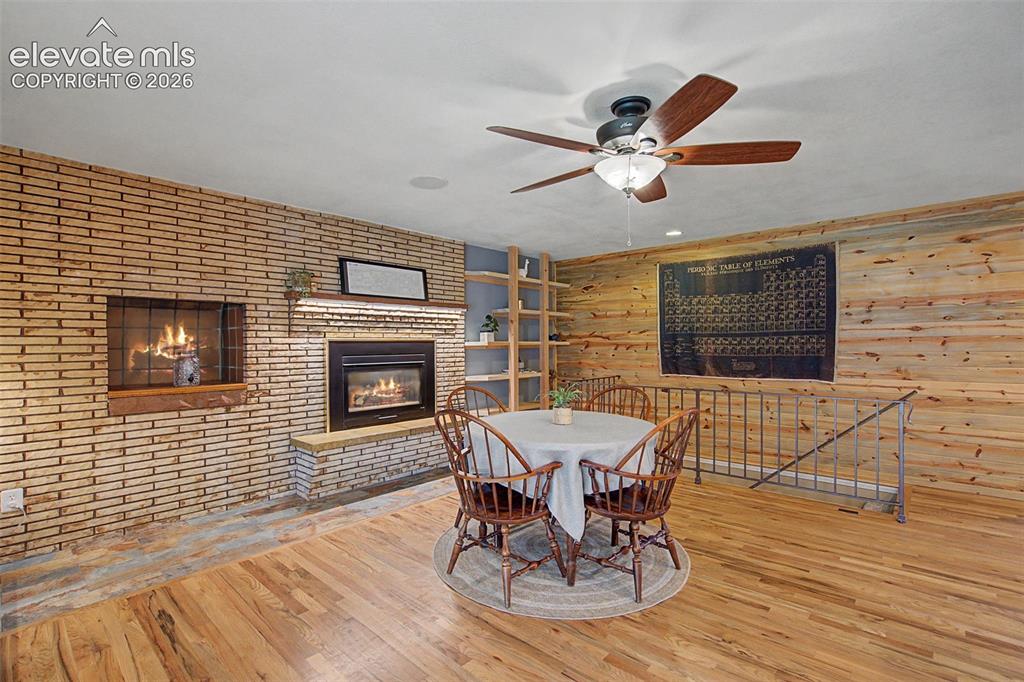 Image 13 of 34: Family room fireplace and built-ins.