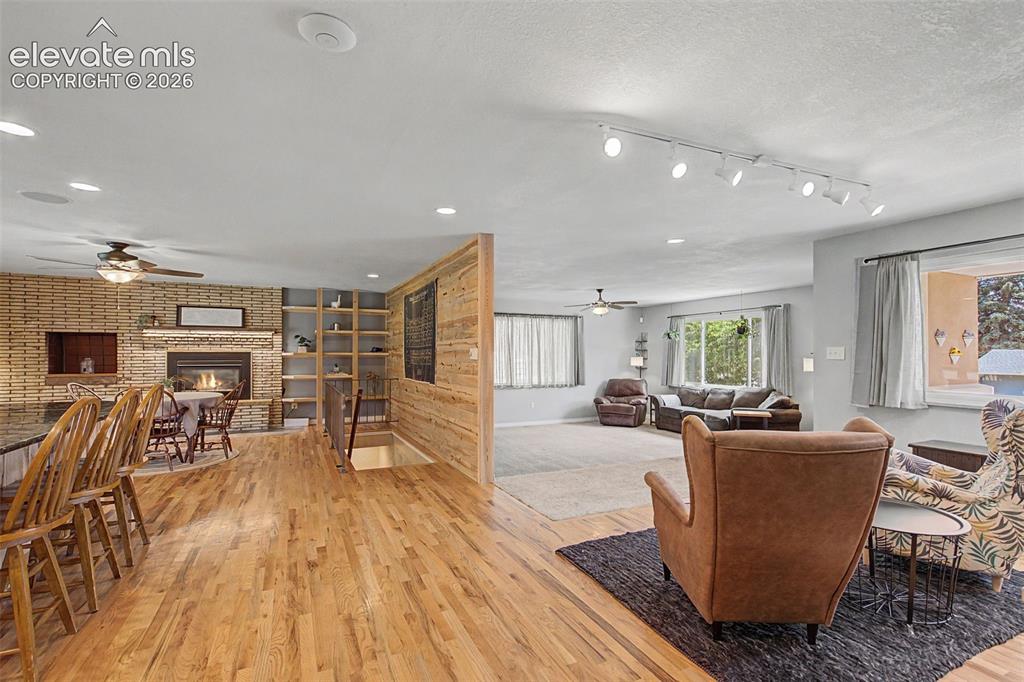 Image 15 of 34: View from dining area to living room.