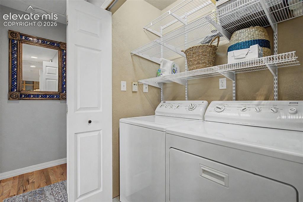 Image 26 of 34: Main level laundry closet