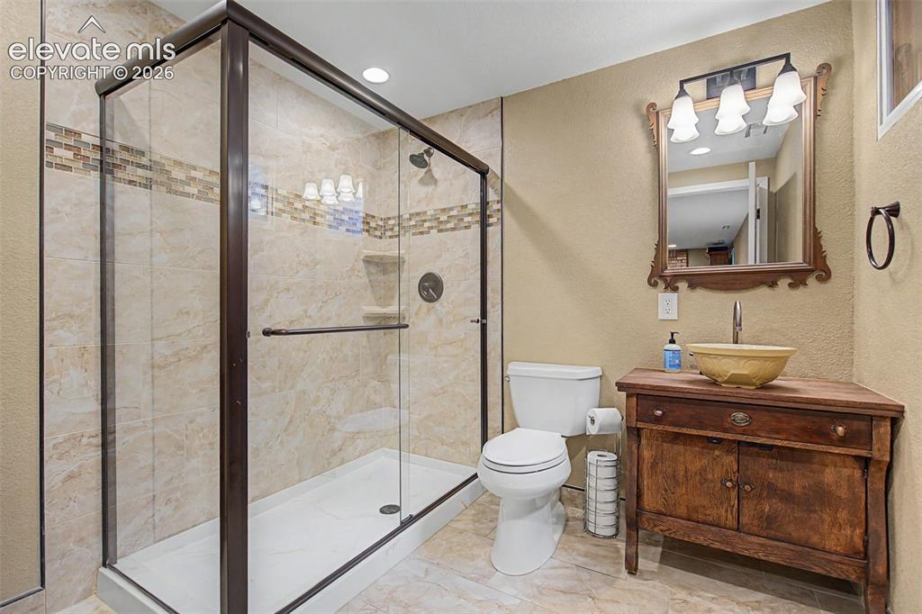 Image 29 of 34: 3/4 bath in the basement