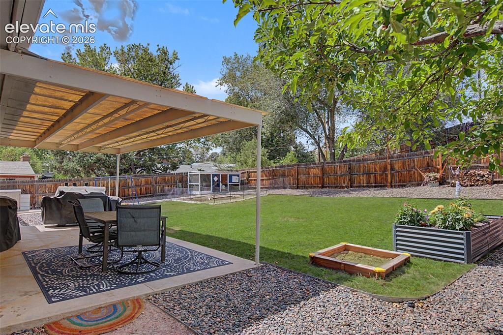 Image 31 of 34: Covered patio
