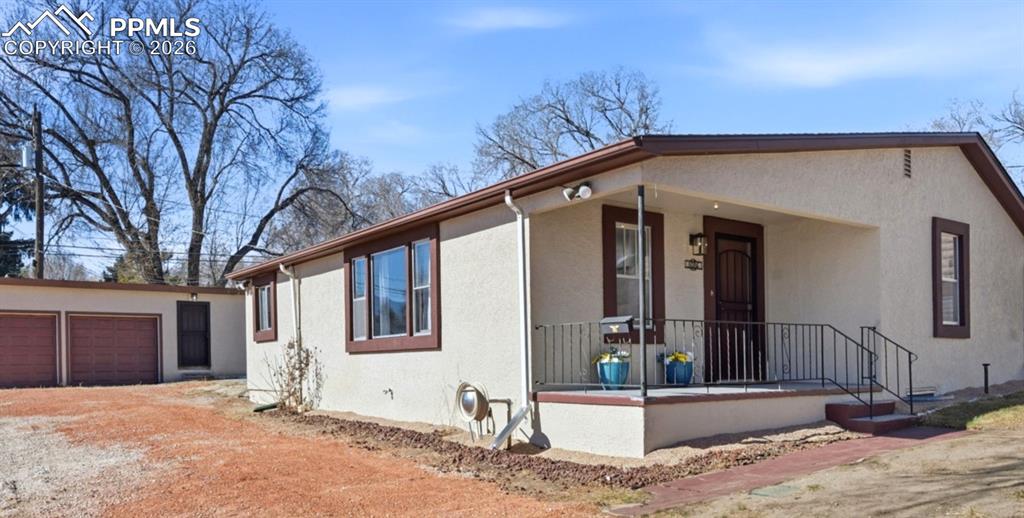 Image 5 of 50: Massive 15,000 s/f lot with detached 2 car garage with a mechanics bay and