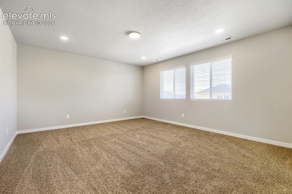 Image 16 of 31: Master Bedroom