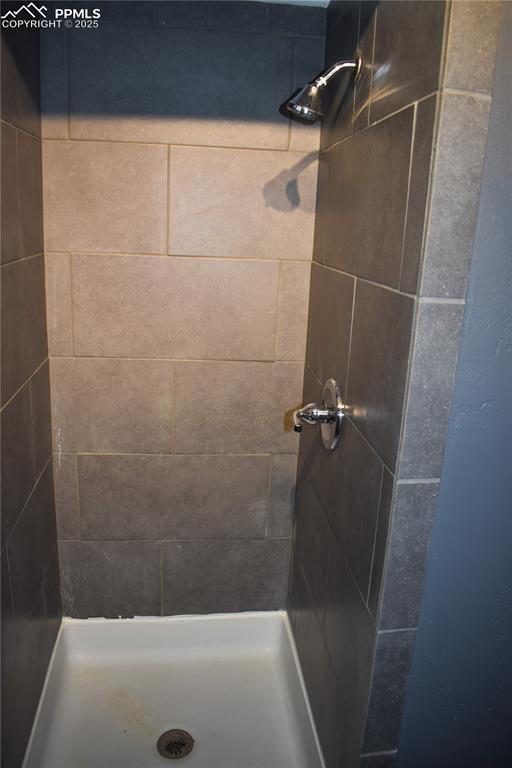 Image 14 of 24: Full bath featuring a shower stall
