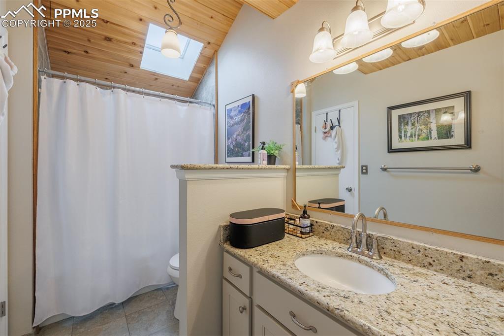Image 8 of 15: Full bathroom upstairs 
