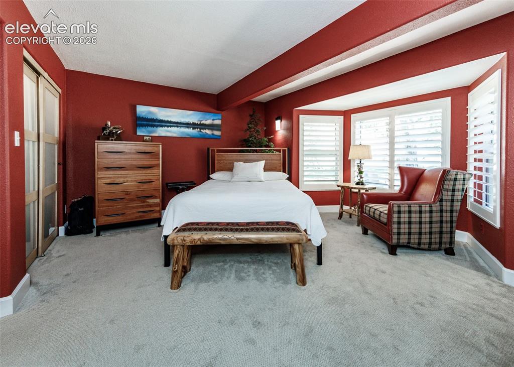 Image 12 of 34: Master Bedroom
