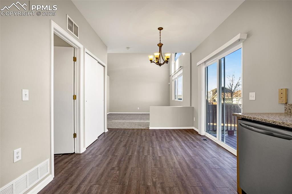 Image 5 of 14: LVP flooring in Kitchen and dining room