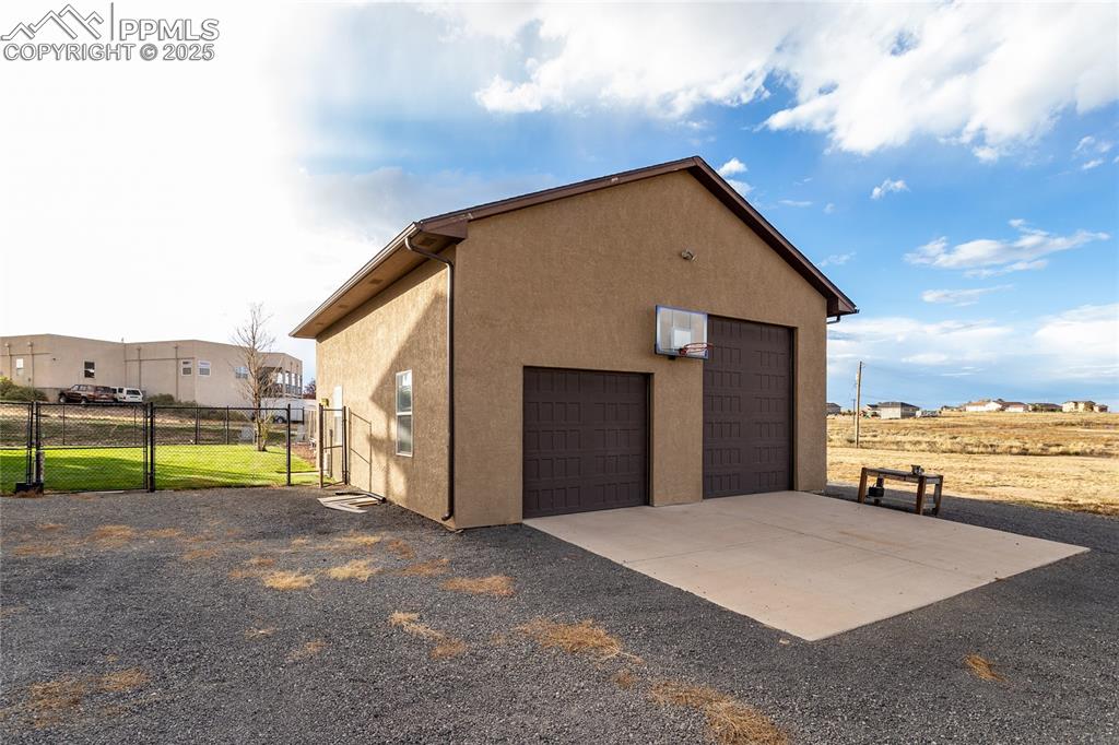 Image 5 of 46: 36 X 30 Shop/RV garage with two RV doors