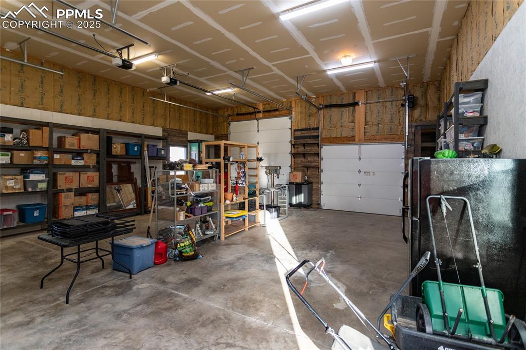 Image 7 of 46: 36 X 30 Shop/RV garage with two RV doors
