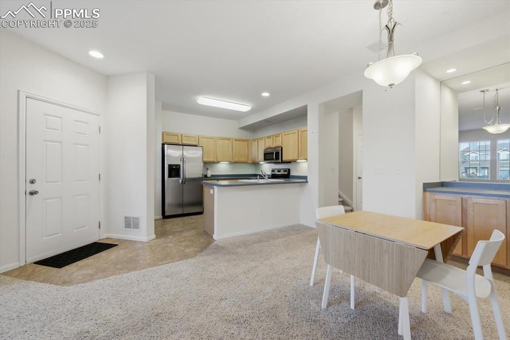 Image 11 of 32: Dining area with coffee bar.