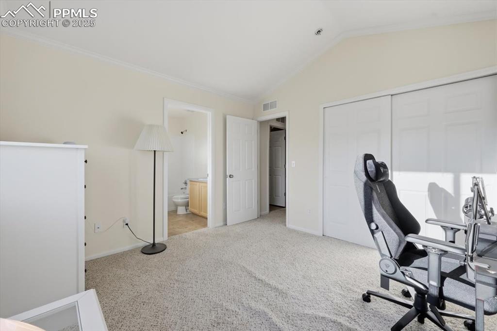 Image 15 of 32: Upper level junior suite with attached bathroom.