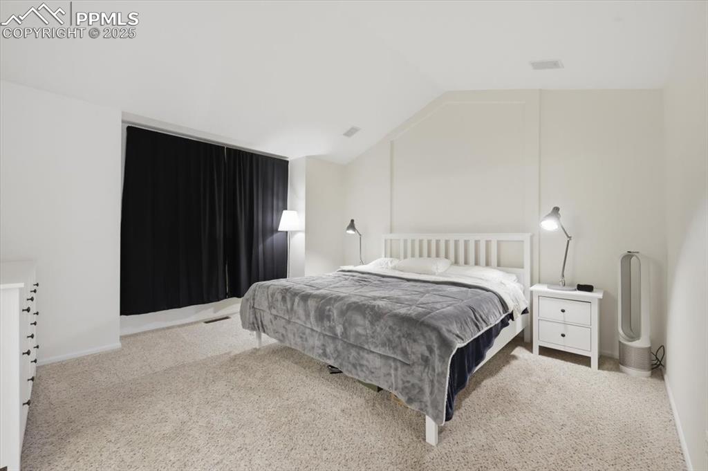 Image 19 of 32: Upper level primary suite.