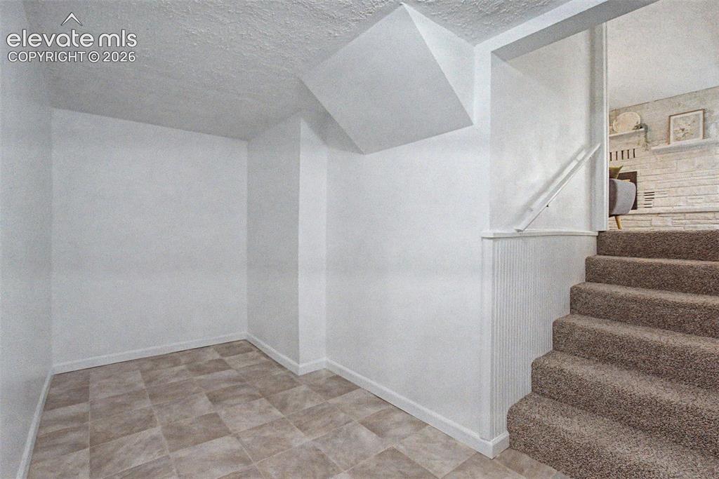 Image 33 of 48: Nook area in Basement - a great study space or library, or turn it into a g