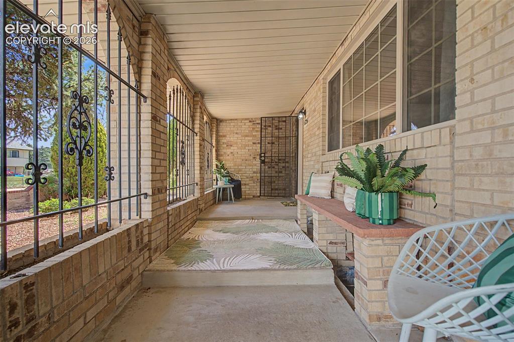 Image 8 of 48: Front Porch Oasis