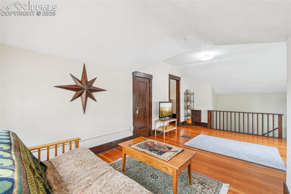 Image 27 of 49: Upstairs living area for office, entertaining, playroom, you name it