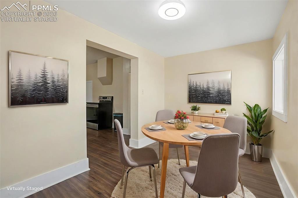 Image 7 of 23: Virtually staged dining room