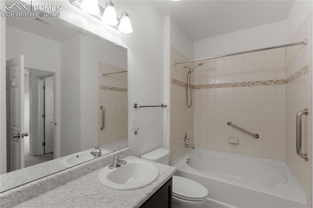 Image 19 of 33: handles in & out of tub/shower