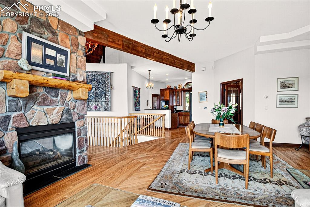 Image 22 of 50: Family room looking to dining area