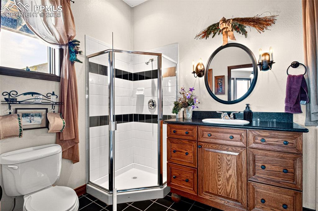 Image 46 of 50: 4 piece bathroom lower level 