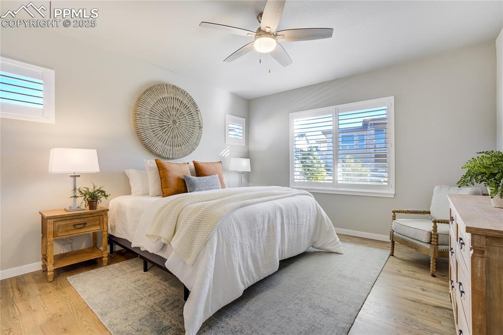 Image 19 of 50: A serene retreat featuring hardwood floors, spacious layout, a walk-in clos
